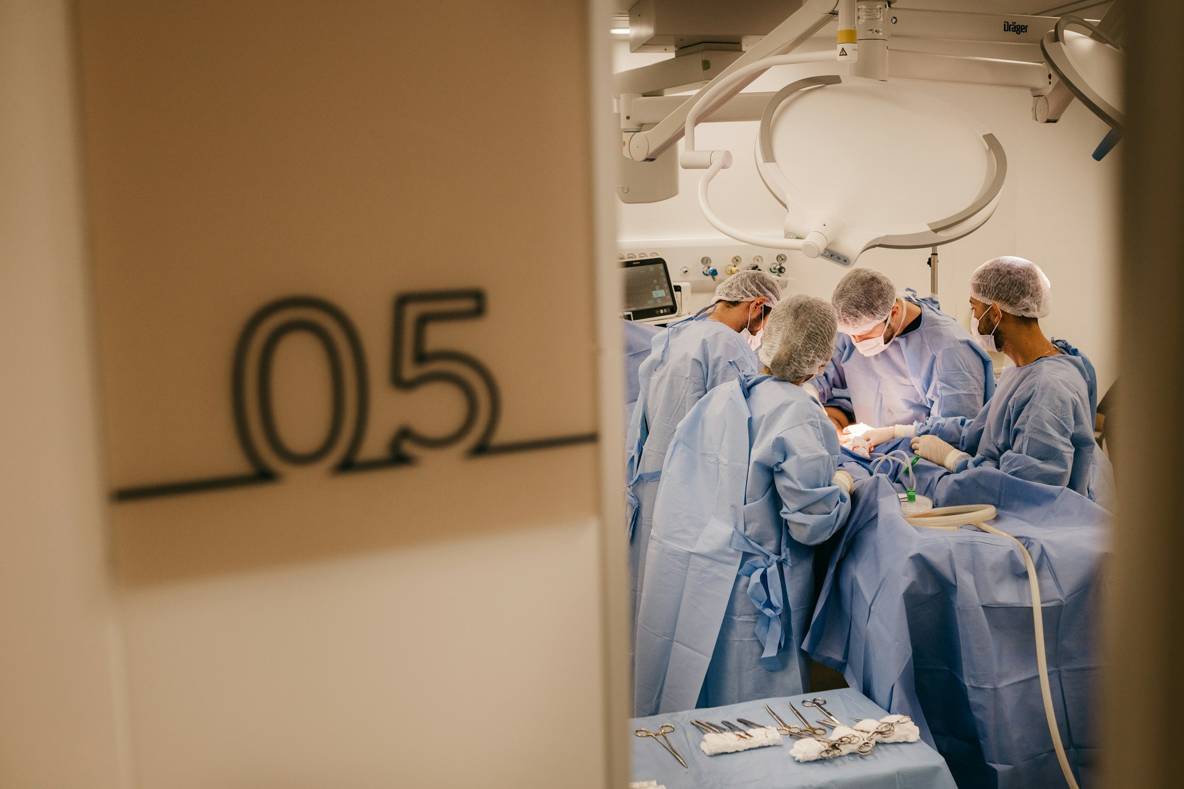 Doctors in a procedure. Photo by Jonathan Borba on Unsplash